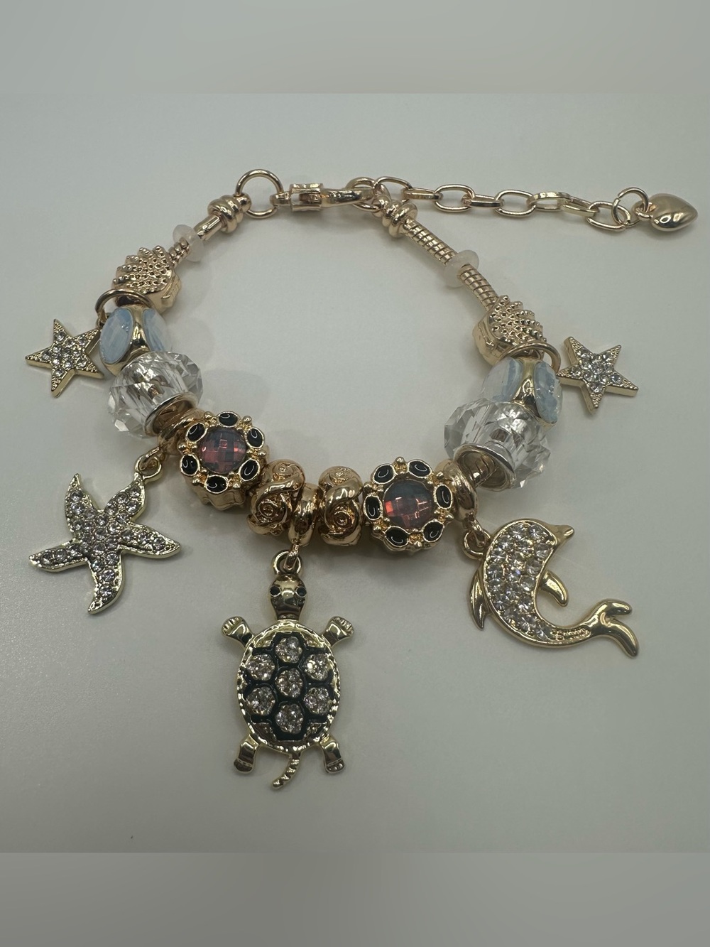 Gold-Tone Sea Life Charm Bracelet with Crystals